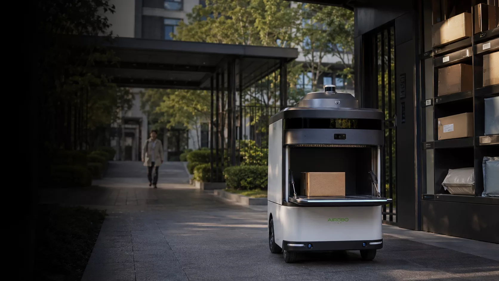 AIROBO 机器人在社区入口完成服务任务的概念配图